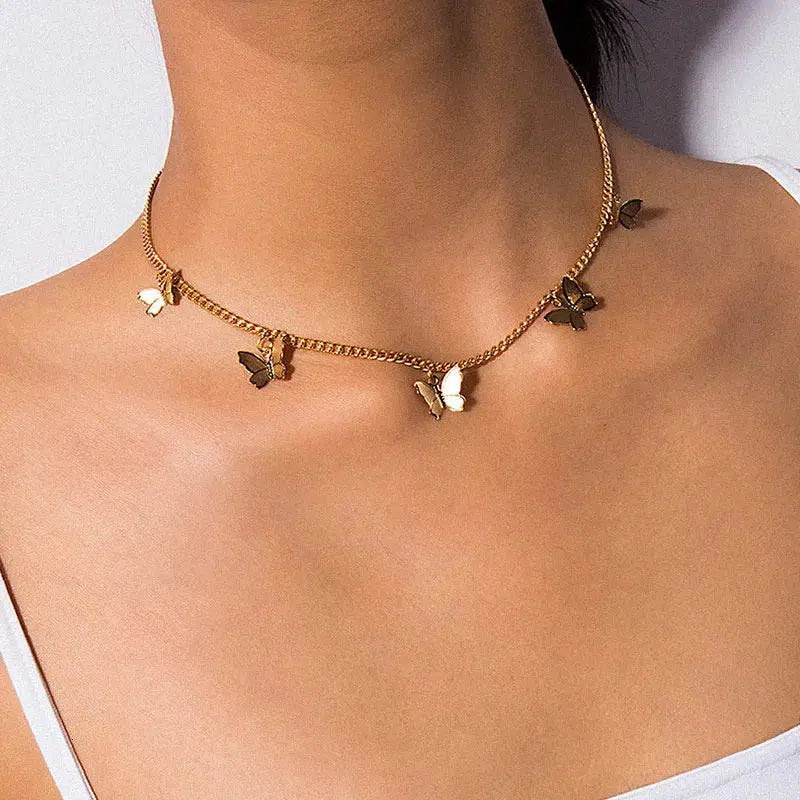 a girl is wearing Chain Butterfly Necklace