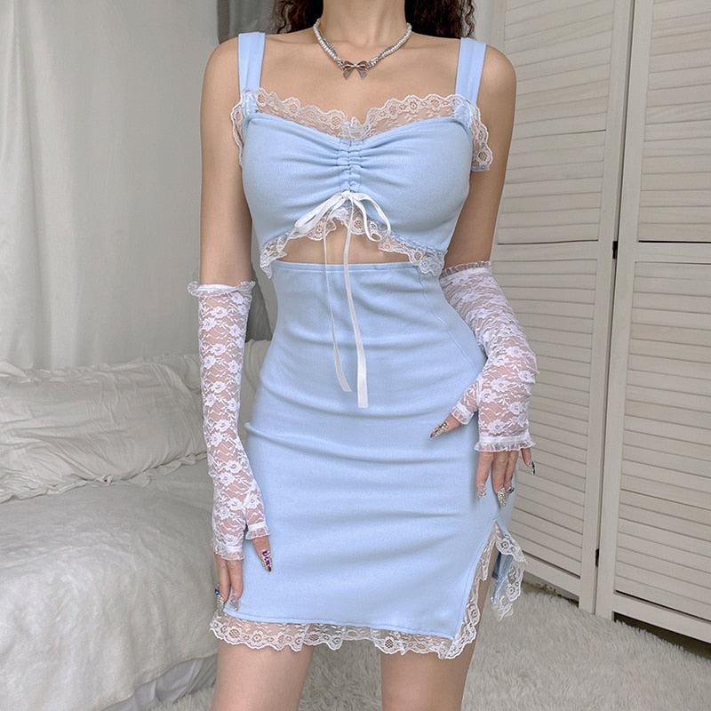 a girl wearing a baby blue coquette aesthetic cut out mini dress and white lace gloves