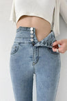 Cut Out Cross Waistband Skinny Jeans