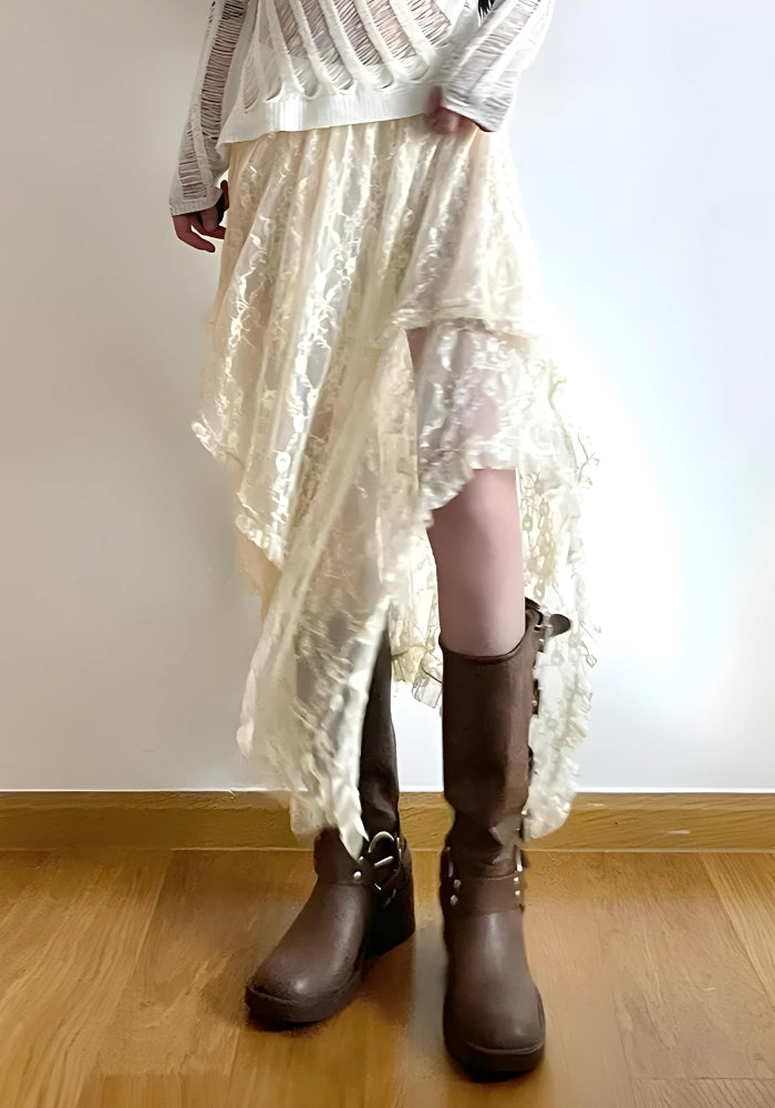 a girl is wearing a fairy grunge lace midi skirt in beige and brown boots and a white long sleeve top for acubi fashion