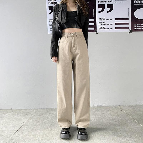 une fille porte un pantalon jean taille haute light academia