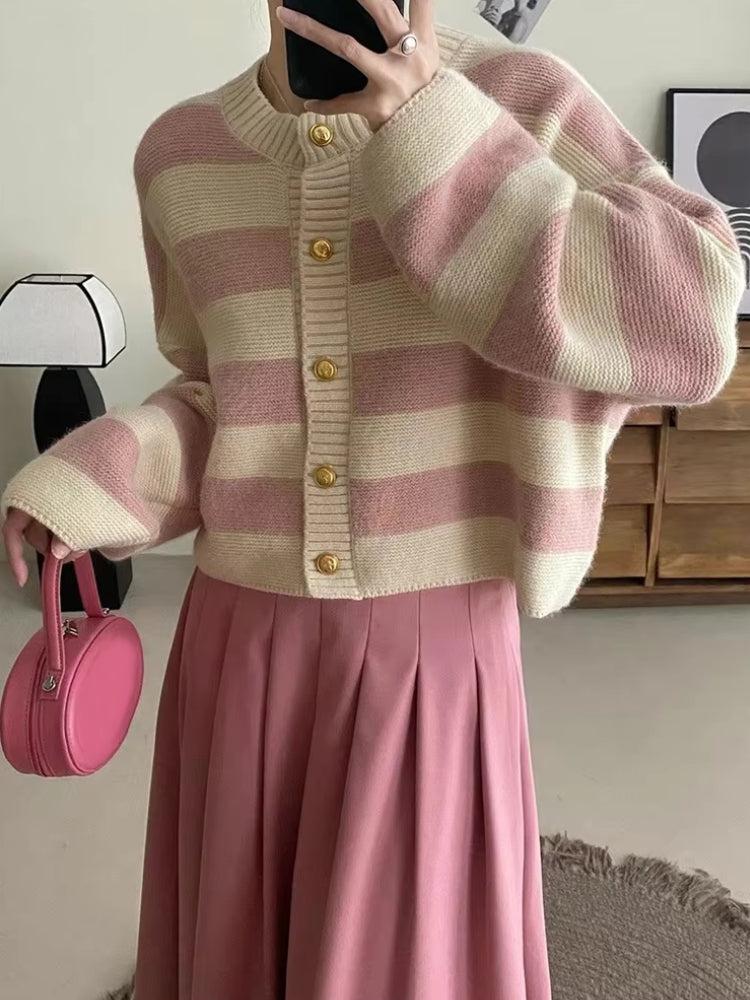 A stylish striped cardigan featuring a blend of colors, perfect for adding a touch of elegance to any outfit.