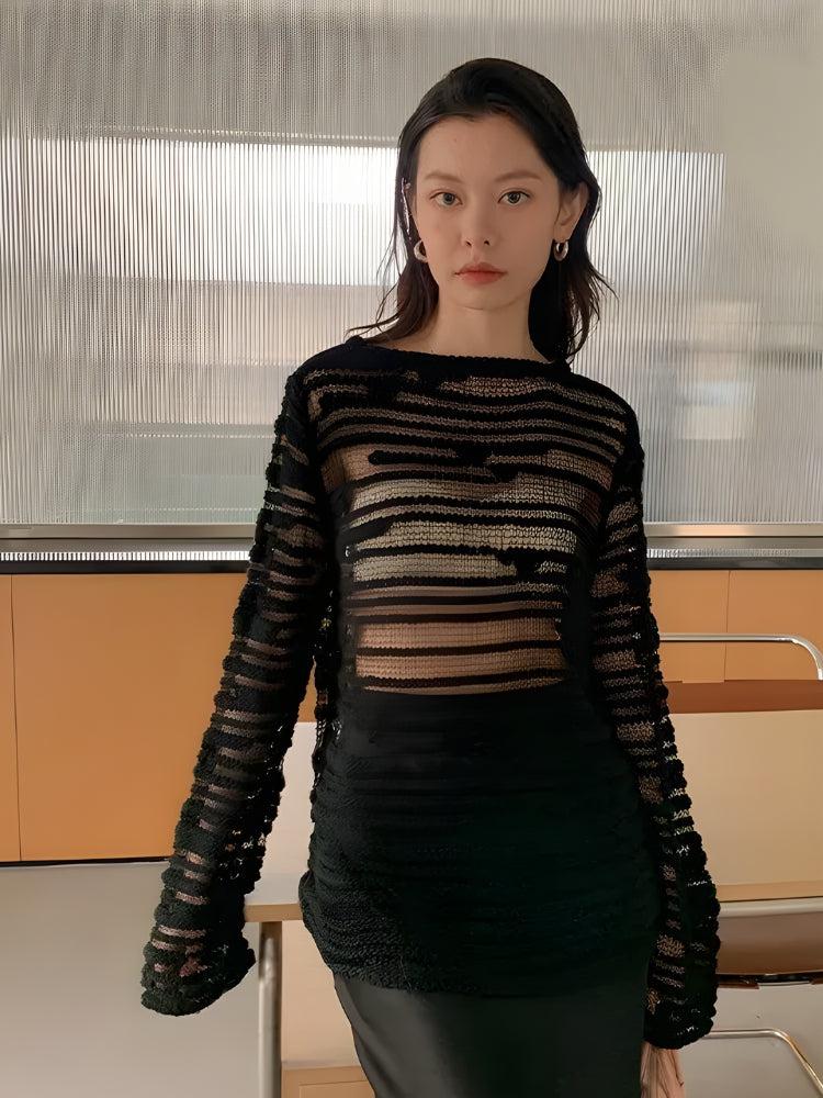 a girl is wearing a Sheer Loose Knitted Sweater