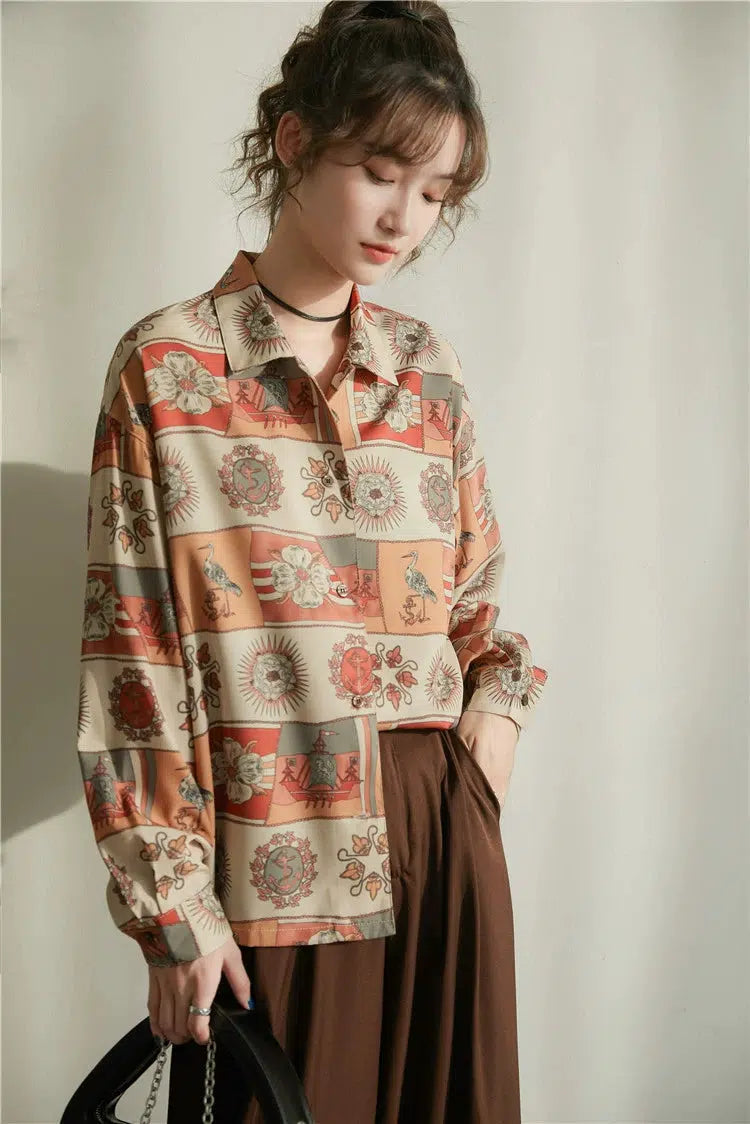 a girl is wearing a brown vintage floral maxi dress and a vintage figured grandmacore shirt and brown pants