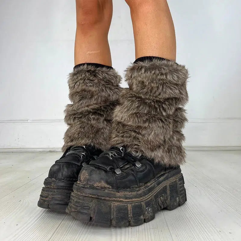 a girl is wearing y2k grunge faux fur leg warmers in brown for acubi fashion